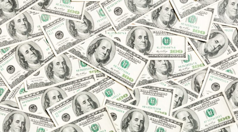 Billetes de dólar que ilustran el dólar en 2026
