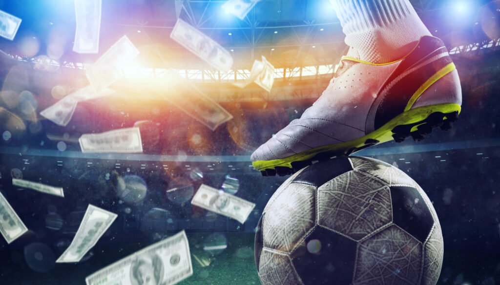 Billetes cayendo sobre un estadio de fútbol que ilustran los premios de la FIFA