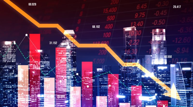 Riesgo país: gráficos en baja del mercado financiero sobre una ciudad