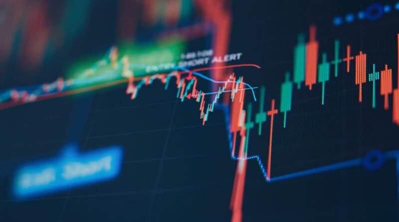 acciones argentinas: gráfico de velas verdes y rojas en una pantalla de mercado