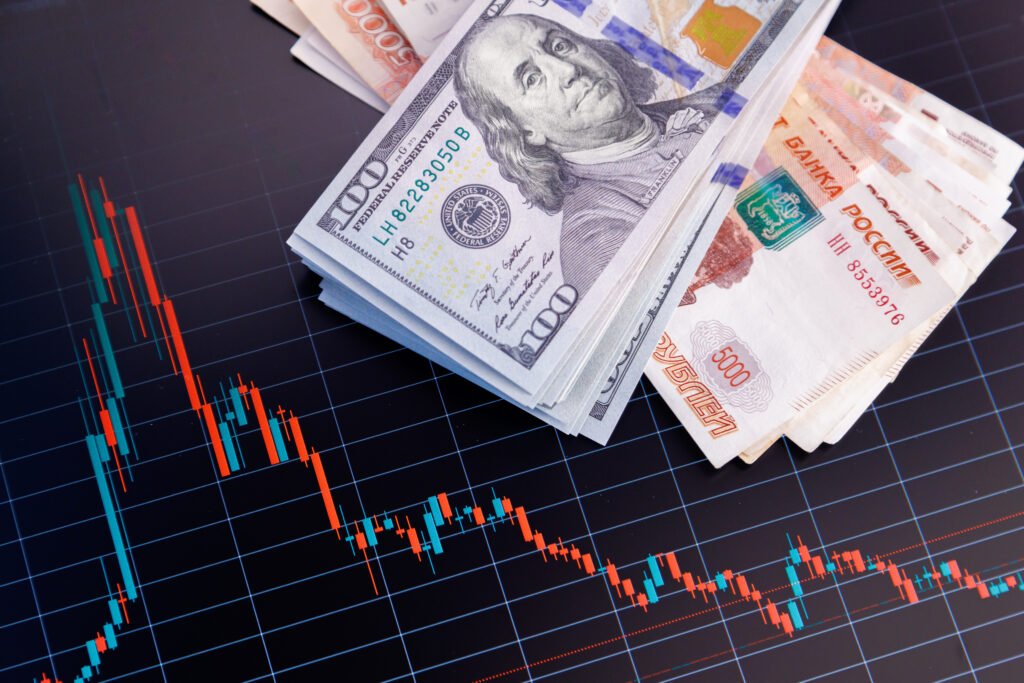 dólar planchado: billetes de dólar sobre un gráfico de cotización