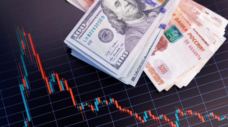 dólar planchado: billetes de dólar sobre un gráfico de cotización