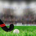 Las Leonas campeonas: cancha de hockey sobre césped con espacio de copia