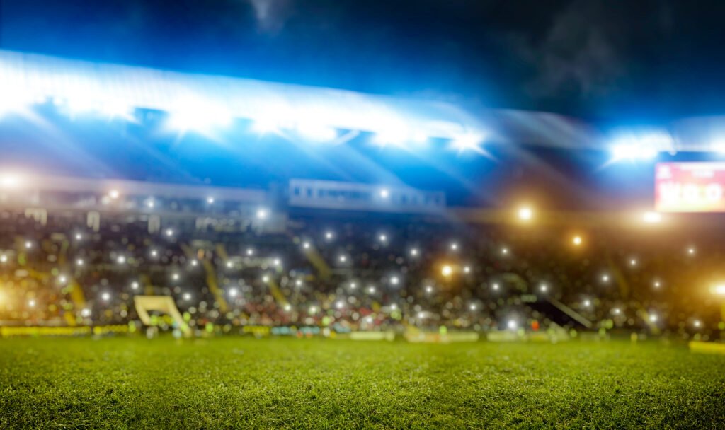 Boca a semifinales: estadio de fútbol con hinchas y luces de noche
