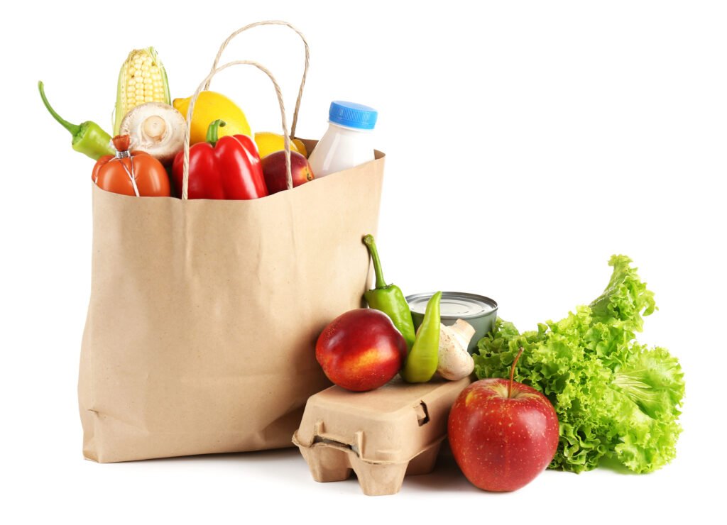 canasta básica: bolsa de compras con alimentos