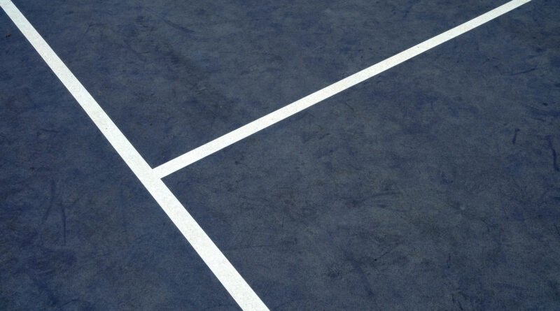 Cerúndolo ante Fritz: cancha de tenis de superficie dura azul