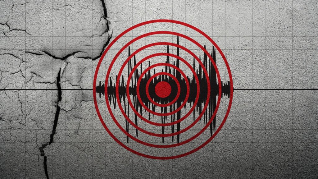 sismo en Tucumán: ondas sísmicas concéntricas sobre una pared agrietada