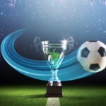 Boca en la Sudamericana: copa de fútbol dorada junto a una pelota