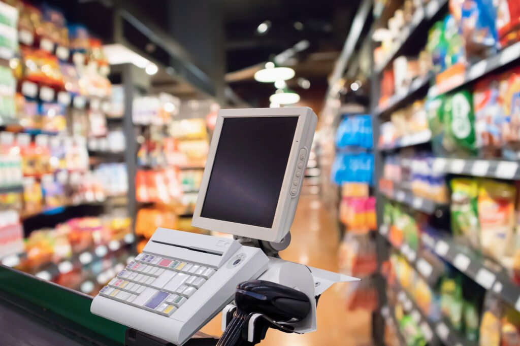 recaudación de septiembre: caja de supermercado y terminal de pago