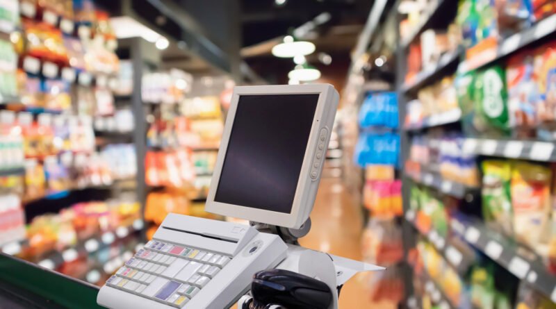 recaudación de septiembre: caja de supermercado y terminal de pago